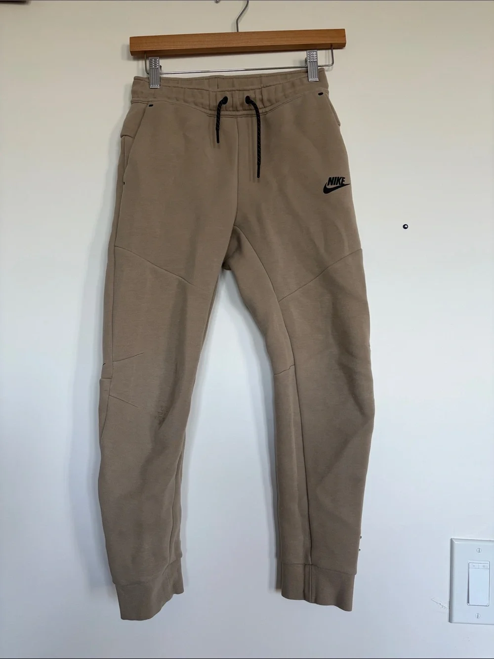 Nike Beige Pants with Light Blue Jeans and Brown Joggers